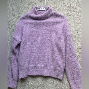 Purple sweater.